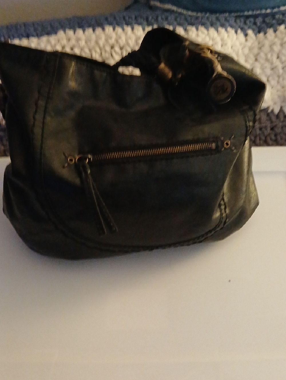 The Sak Black Leather Shoulder Bag with Front Zip